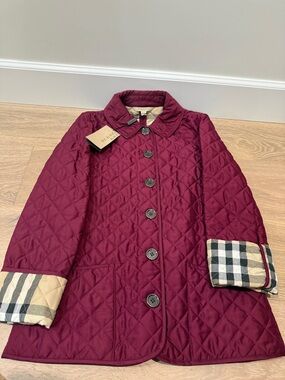 Brand new authentic Burberry Quilted Wine Red Jacket with Classic Check Lining